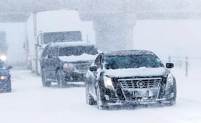 Bomb Cyclone Packed Blizzard Blasts 100 MPH Winds Across Central US - Sakshi