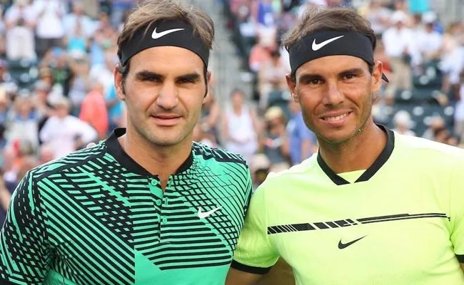 Roger Federer And Rafael Nadal roll into quarters at Indian Wells - Sakshi