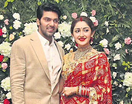 Newly weds Arya and Sayyeshaa pair up for a new movie - Sakshi