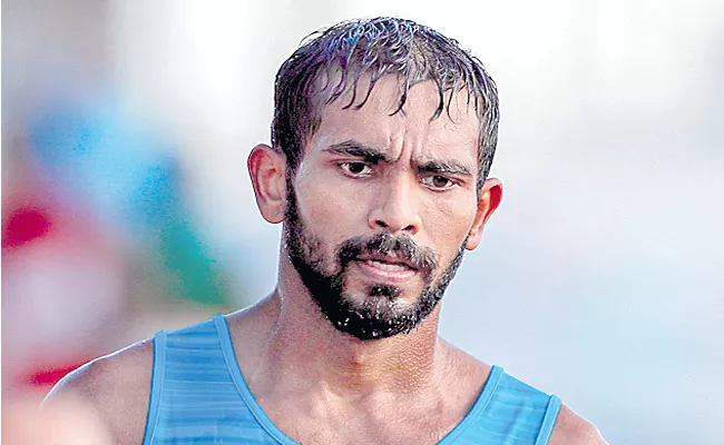 KT Irfan becomes first Indian athlete to qualify for Tokyo Olympics - Sakshi