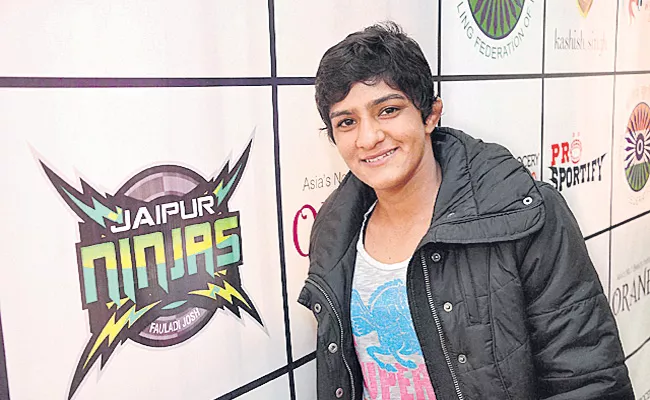  Wrestler Ritu Phogat dropped from TOPS - Sakshi