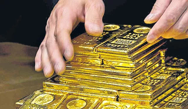 Gold imports dip 5.5% during April-February - Sakshi