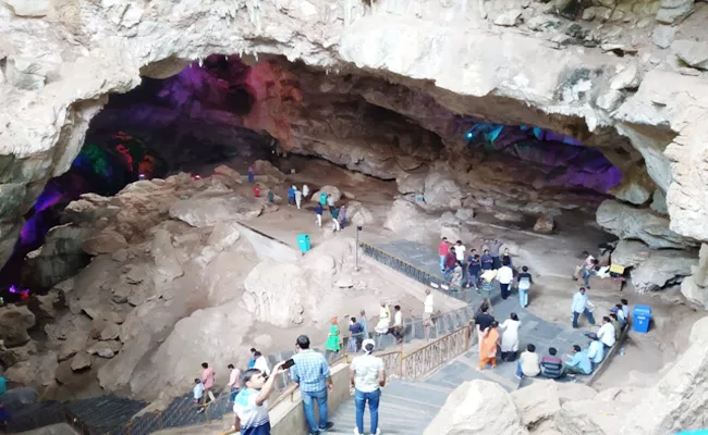 Tourists Hikes in Borra Caves Visakhapatnam - Sakshi