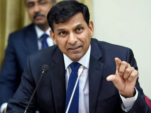 Raghuram Rajan Says Rahul Gandhis NYAY Scheme Workable - Sakshi