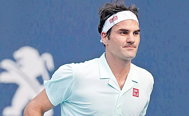 Roger Federer enter to Pre-Quarter finals - Sakshi