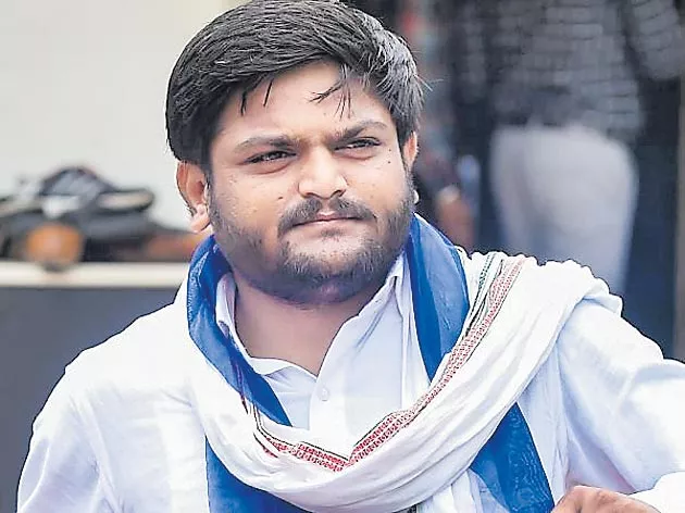 Hardik Patel Can not Contest Polls as Gujarat HC Refuses to Stay Conviction - Sakshi