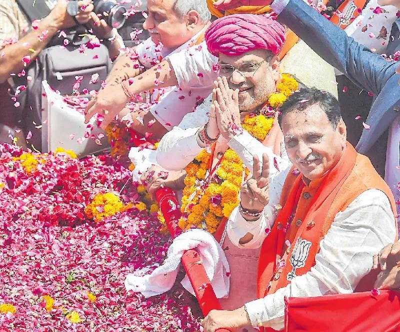 Amit Shah files nomination for Gandhinagar - Sakshi