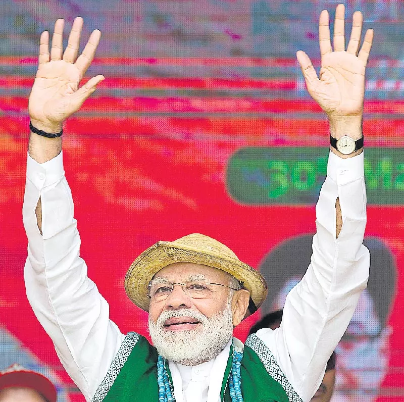 Modi blames Cong for infiltration problems in Assam, rest of Northeast - Sakshi