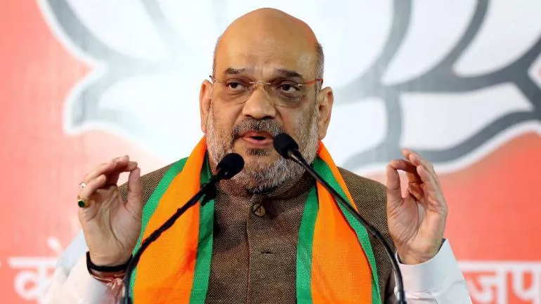 Congress Blasts Amit Shah Over Airstrikes - Sakshi