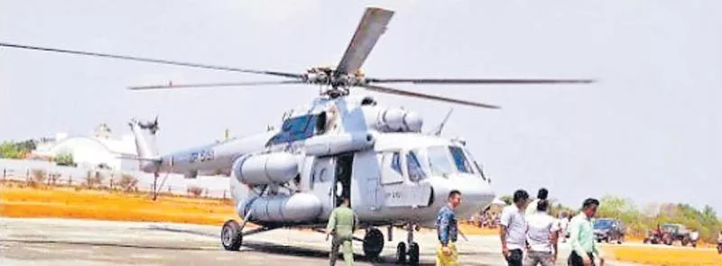 Army helicopter landed in the spot - Sakshi