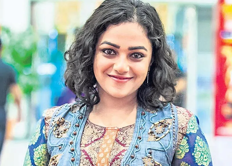 Nithya Menen in Rajamouli RRR - Sakshi