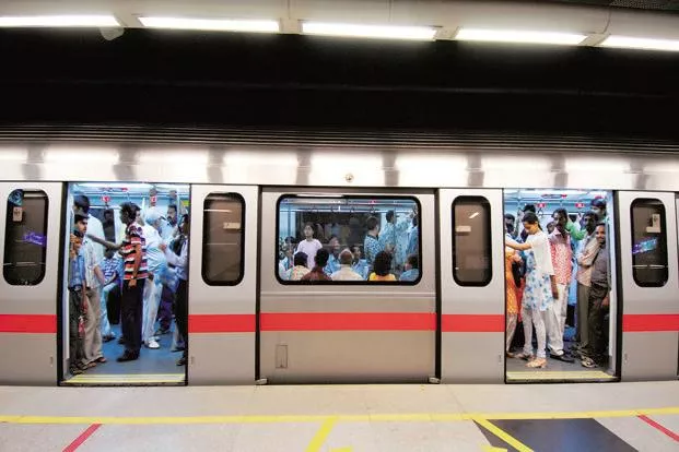 Woman dragged on platform after saree gets stuck in metro door - Sakshi