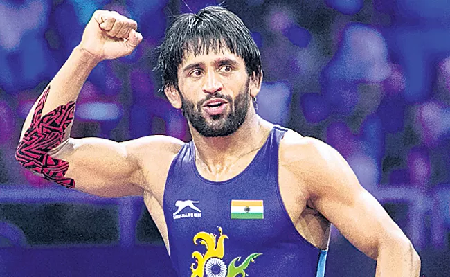 Wrestler Bajrang Punia becomes world number 1  - Sakshi