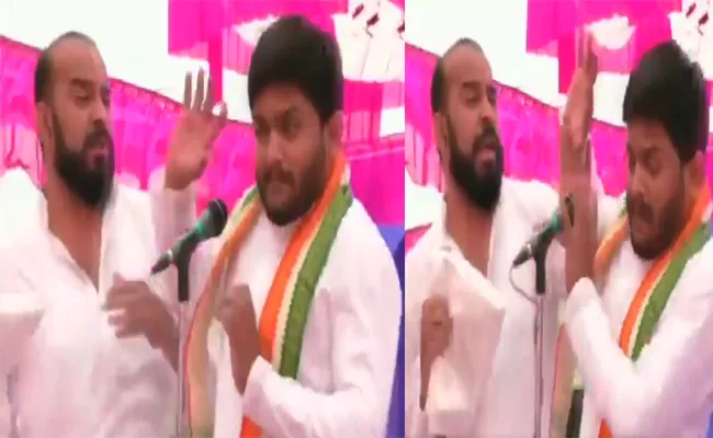 Congress Leader Hardik Patel Slapped in Public Meeting - Sakshi