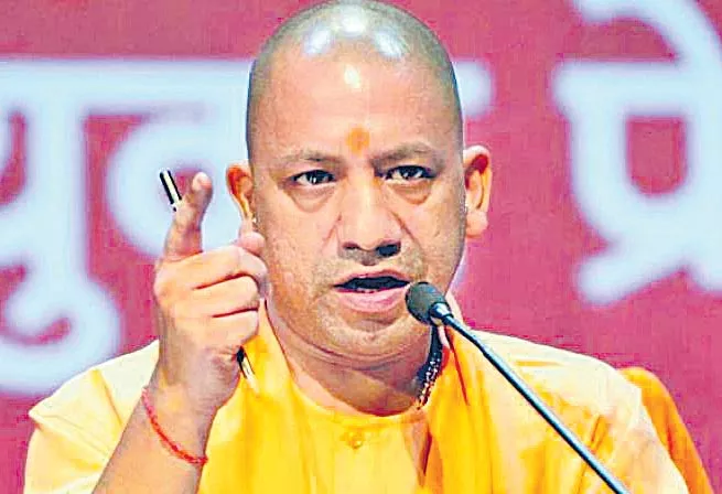 Yogi Adityanath is a controversial comments on Military Forces - Sakshi