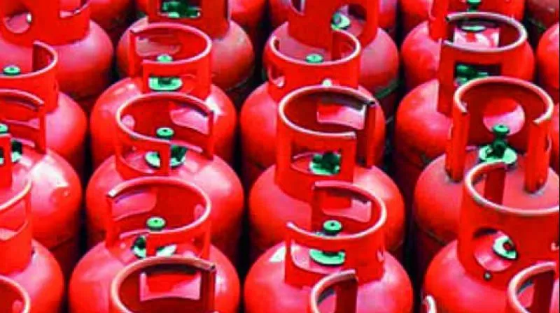 LPG cylinder prices hiked  - Sakshi