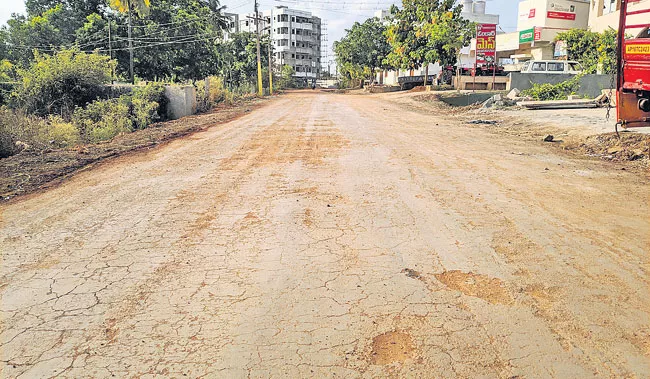 Chemical Road Failed In Gannavaram - Sakshi