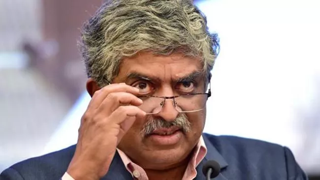 Nandan Nilekani Says Aadhaar Just An ID - Sakshi