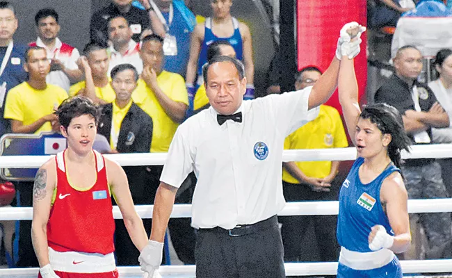 Nikhat Zareen upsets two-time world champion to enter semi-finals  - Sakshi