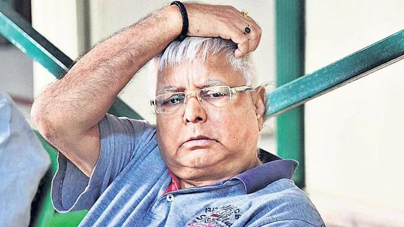 Lalu Prasad Yadav will contest against real Lalu's samdhi - Sakshi