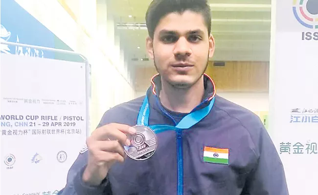 ISSF World Cup: Divyansh bags silver medal - Sakshi