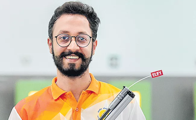 Abhishek Verma shoots gold, secures Olympic quota - Sakshi