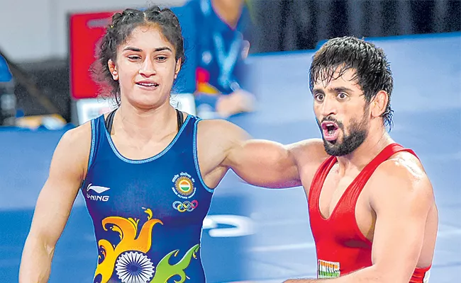 Vinesh Phogat, Bajrang Punia recommended for Rajiv Gandhi Khel Ratna - Sakshi