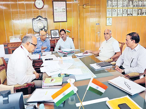 Genco CMD meeting with the South Central Railway GM - Sakshi