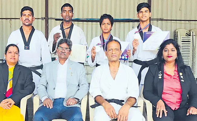 Karan Gets Gold Medla in Taekwondo Championship - Sakshi