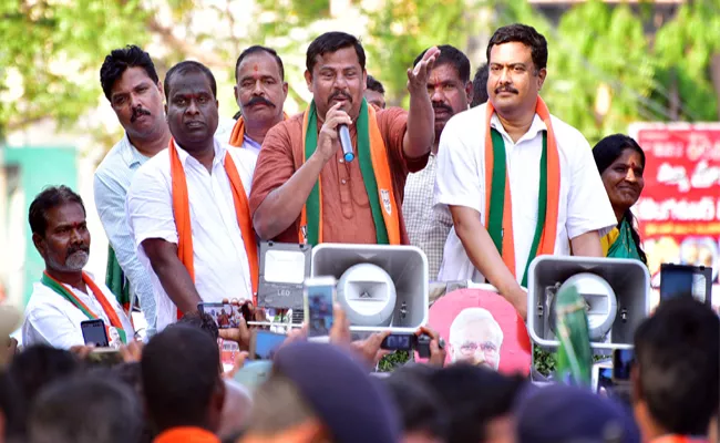 Bjp Raja Singh: To win the BJP and give Modi a gift - Sakshi