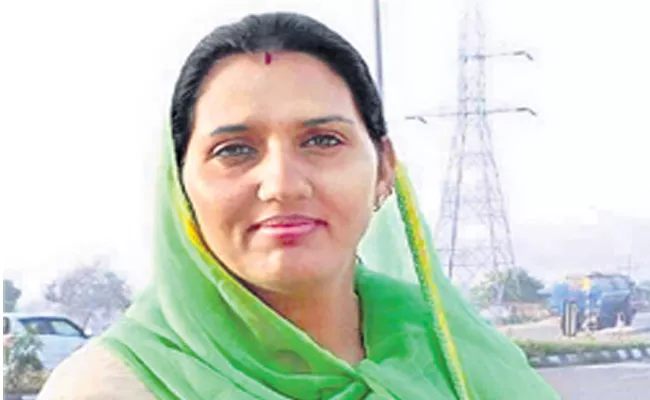 Congress Fields Olympic Krishna Poonia From Jaipur Rural Seat - Sakshi