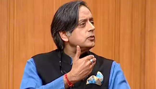 Shashi Tharoor Dares Modi To Run From Kerala Or Tamil Nadu - Sakshi