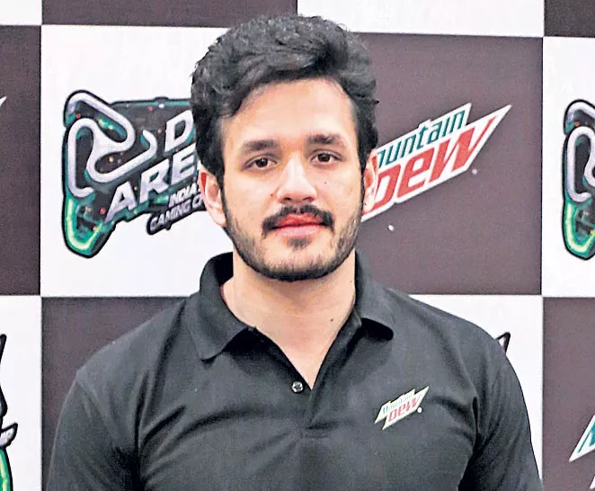 akhil next movie bommarillu bhaskar and gopi sundar - Sakshi