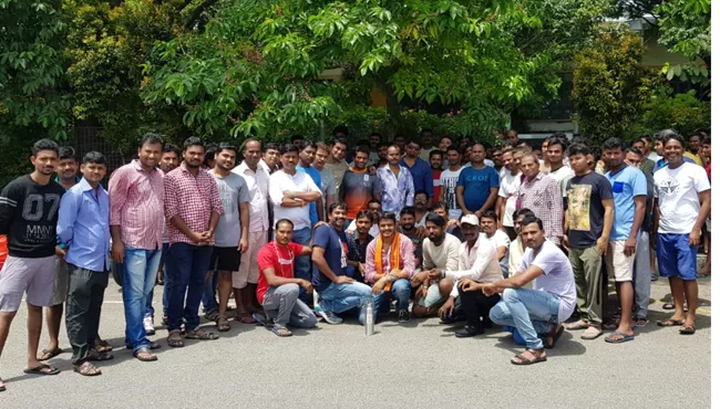 STS members celebrates may day with workers in Singapore - Sakshi