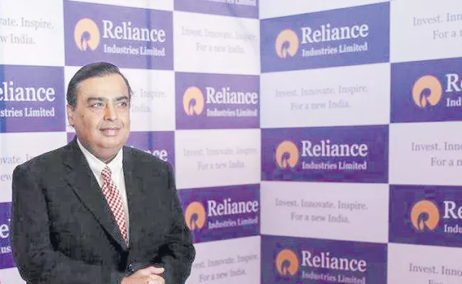 Reliance Industries overtakes Indian Oil to become largest company - Sakshi