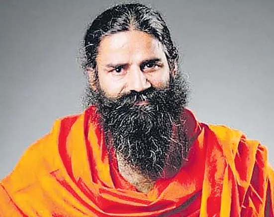 Baba Ramdev Advocates Denial of Rights to Third Child As Population Control Measure - Sakshi