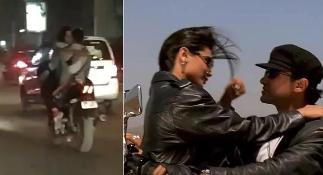 Couple Makes Out On Running Bike On Delhi Road In Viral Video - Sakshi