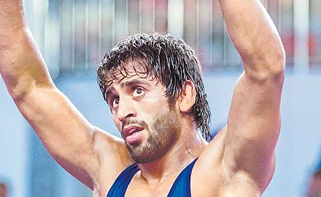 Bajrang Punia bags gold in Ali Aliyev wrestling tournament - Sakshi