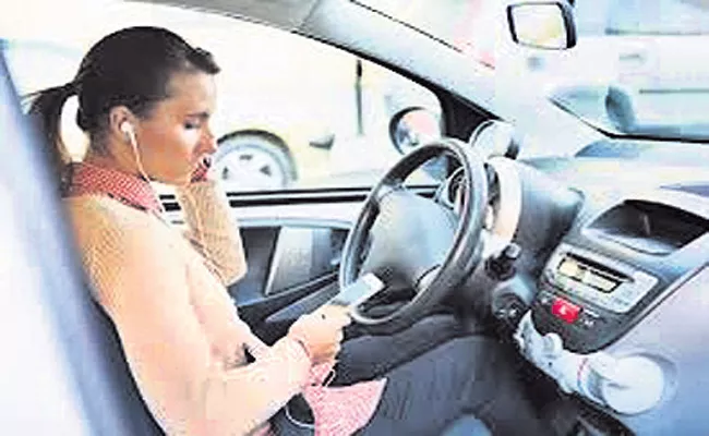 No Earphones While Driving - Sakshi