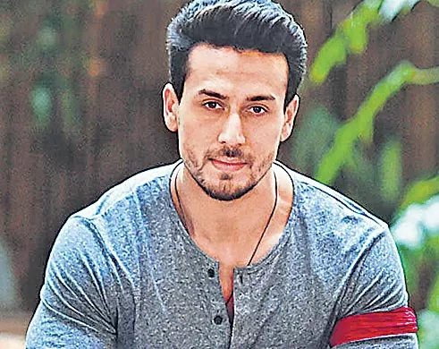 Tiger Shroff reveals why he does not want to do a film with dad Jackie Shroff - Sakshi