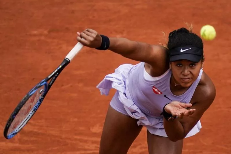 Naomi Osaka rallies again at French Open to beat Azarenka - Sakshi