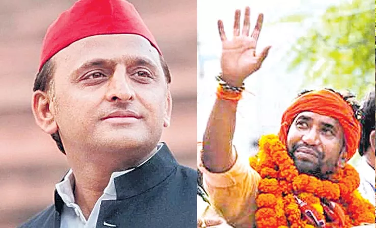 Akhilesh Yadav vs Dinesh Lal Yadav in Azamgarh lok sabha  - Sakshi