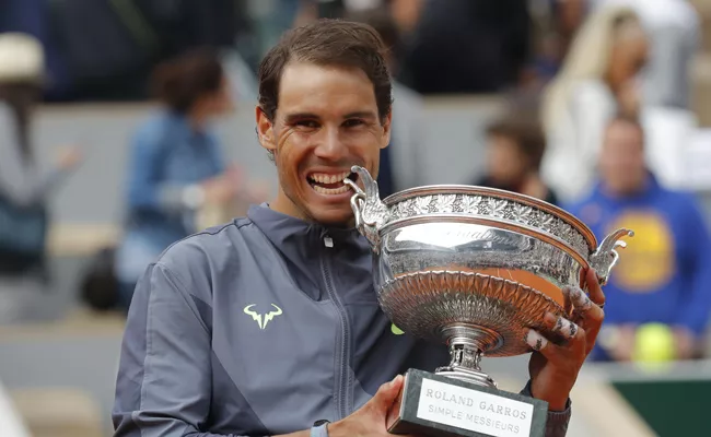 Rafael Nadal beats Dominic Thiem to clinch 12th title at Roland Garros - Sakshi