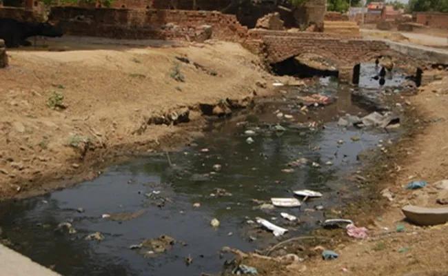 People's Problems With Drainage Water Likeg Wanaparthy - Sakshi