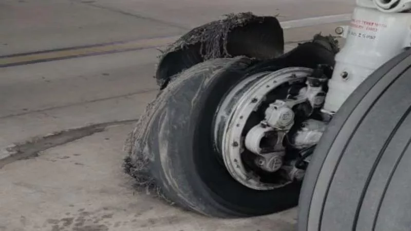 SpiceJet plane from Dubai makes emergency landing in Jaipur after tyre burstf - Sakshi