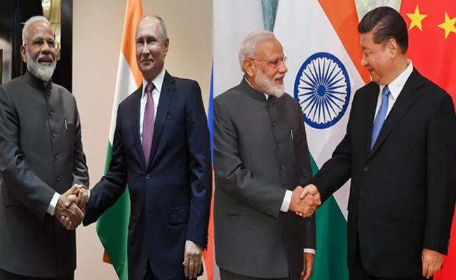 Modi Meets Putin Xinping Over Sco Meet - Sakshi