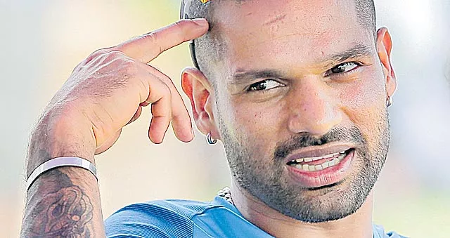 Shikhar Dhawan tweets lines from Rahat Indori's poem after thumb injury - Sakshi