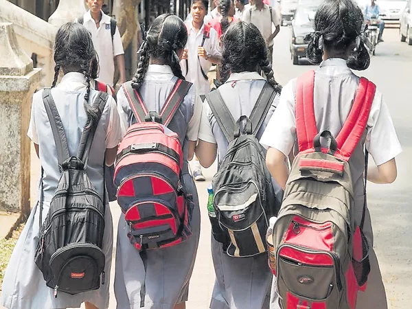 Reduce to the School Students Bag weight - Sakshi