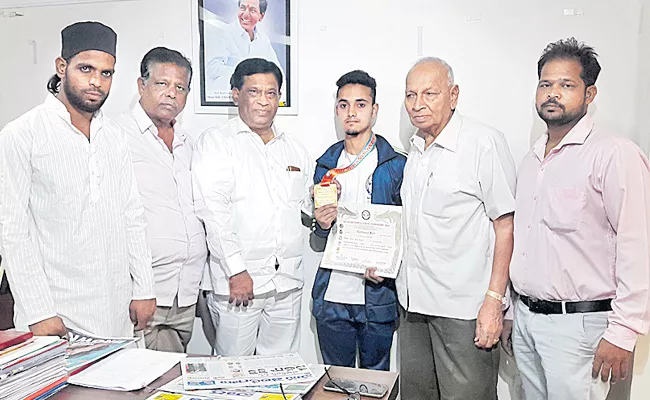 Adil Baba Gets Gold Medal in Karate Championship - Sakshi