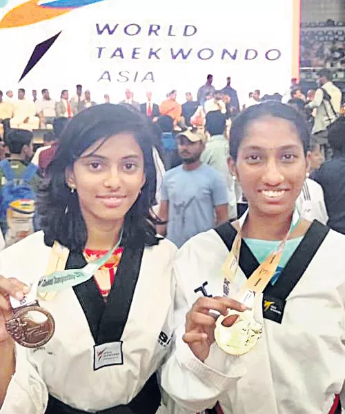 Lakshmi Tulasi Gets Silver Medal In Taekwondo - Sakshi